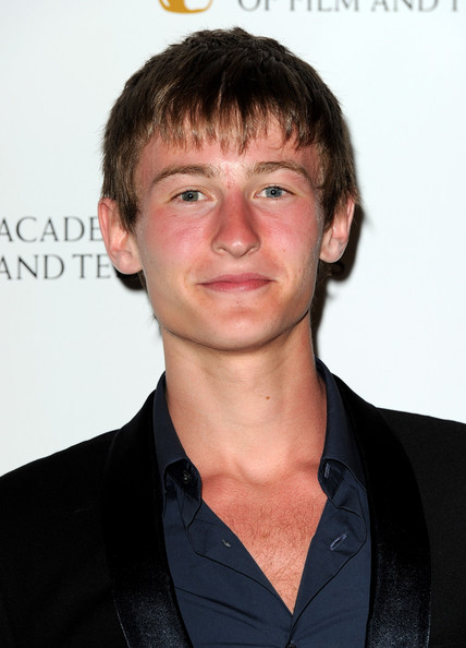 Poze Elliott Tittensor