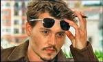 Depp in rolul lui Freddie Mercury