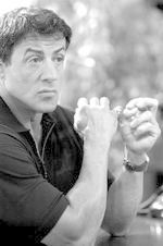 Sylvester Stallone si Jet Li in "The Expendables"