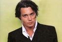 Articol Johnny Depp va fi Roger Moore intr-un film biografic
