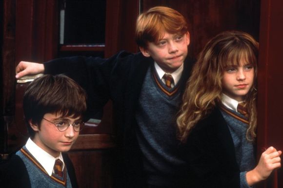 Daniel Radcliffe, Rupert Grint, Emma Watson în Harry Potter and the Sorcerer's Stone
