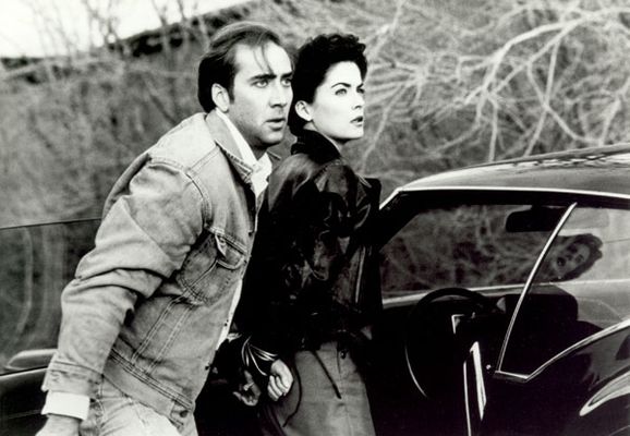 Nicolas Cage, Lara Flynn Boyle în Red Rock West
