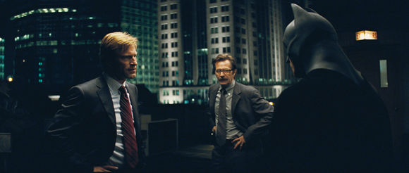 Christian Bale, Aaron Eckhart, Gary Oldman în The Dark Knight