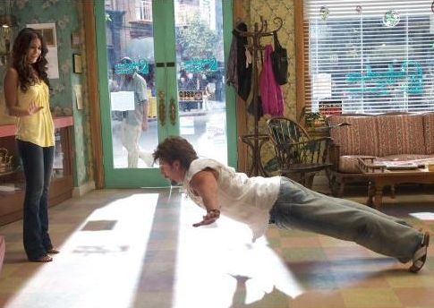 Adam Sandler, Emmanuelle Chriqui în You Don't Mess with the Zohan