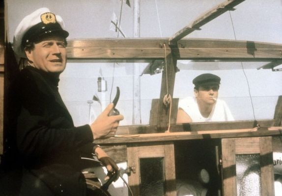 Drei Mann in einem Boot