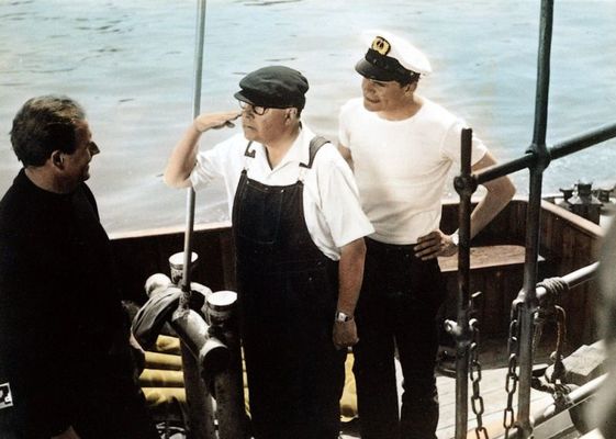 Drei Mann in einem Boot