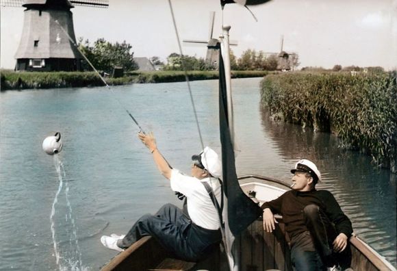 Drei Mann in einem Boot