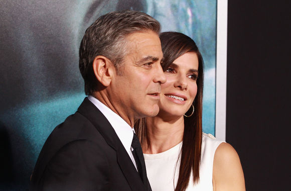 Sandra Bullock, George Clooney în Gravity