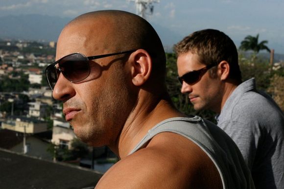 Vin Diesel, Paul Walker în Fast Five