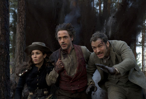 Noomi Rapace, Robert Downey Jr., Jude Law în Sherlock Holmes: A Game Of Shadows