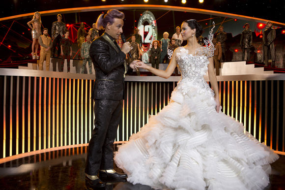 Stanley Tucci, Jennifer Lawrence în The Hunger Games: Catching Fire