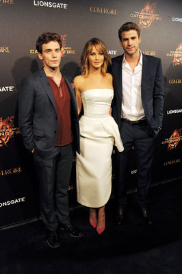 Sam Claflin, Jennifer Lawrence, Liam Hemsworth în The Hunger Games: Catching Fire